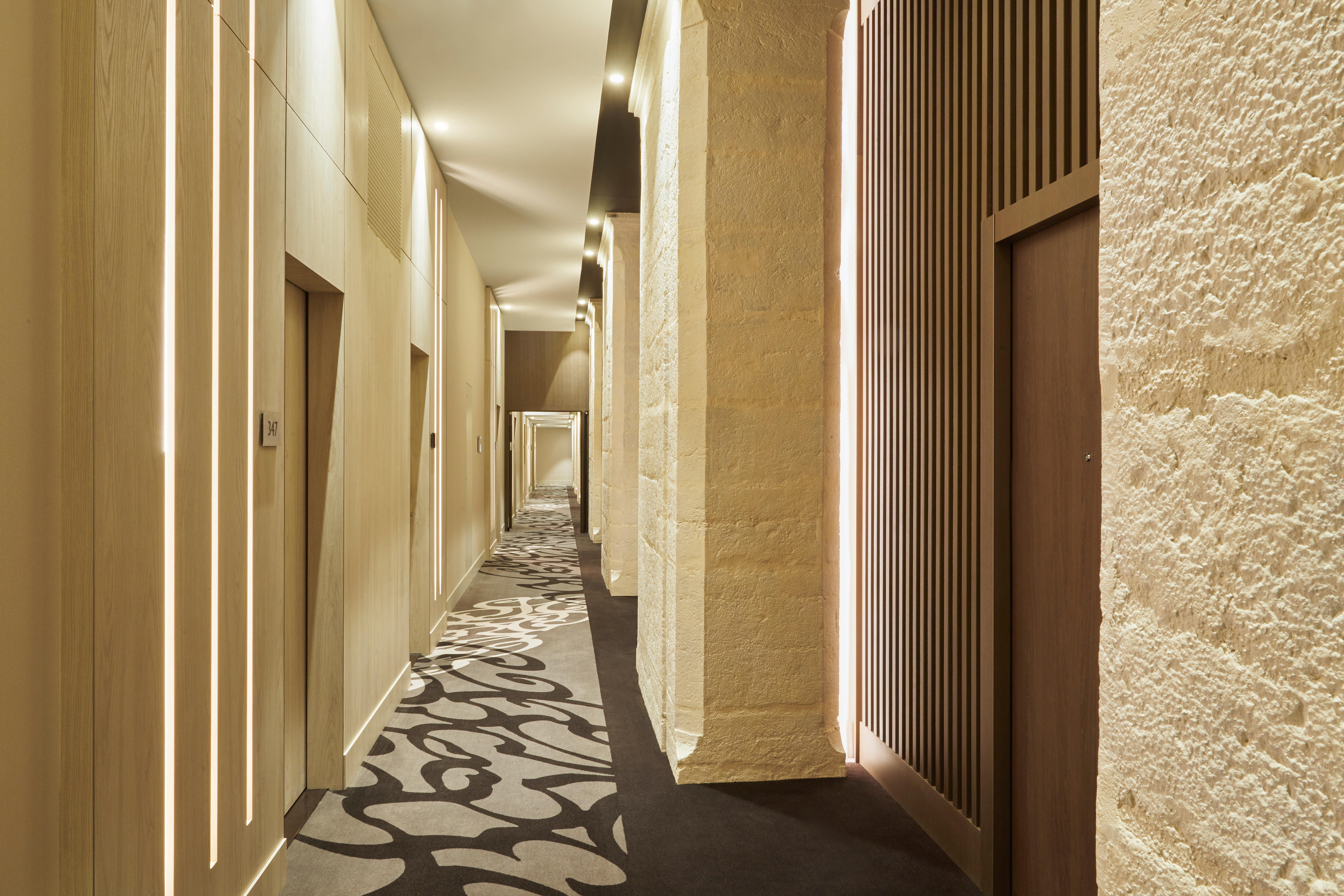 Intercontinental Lyon - Hotel Dieu By Ihg Esterno foto A corridor at the hotel